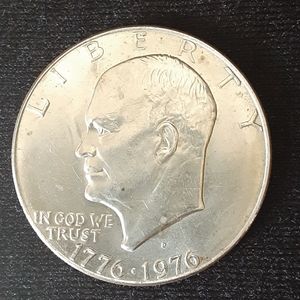 Liberty Bell/ Moon Bicentennial Dollar coin.